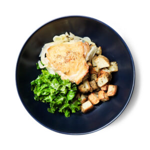 Plate Of White Wine Chicken With Roasted Potatoes & Greens